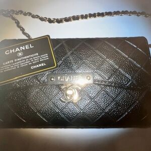 CHANEL Black Quilted Leather Bag